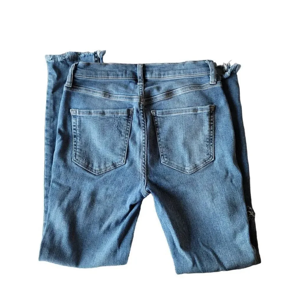 Free people womens Sz W 25 blue distressed raw hem skinny jeans